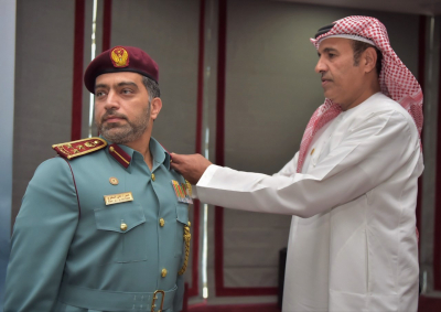 Maj. Gen. Expert Rashid Thani Al Matrooshi decorates a number of DCD officers with their new ranks