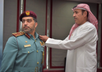 Maj. Gen. Expert Rashid Thani Al Matrooshi decorates a number of DCD officers with their new ranks