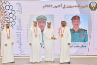His Excel. Lt. Gen. Rashid Thani Al Matrooshi and His Excel. Major Gen. Jamal bin Aded Al Muhairi honor the Services and Equipment Department with the Best Department Award