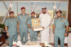 In Participation of Almatrooshi and His Assistants DCD Distributes Flags, Badges to Mark Flag Day  